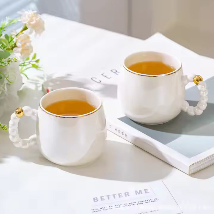 Luxury Porcelain Revolving Tea Set With Gradient Pearl Handles