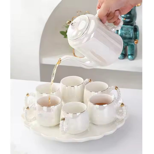 Luxury Porcelain Revolving Tea Set With Gradient Pearl Handles
